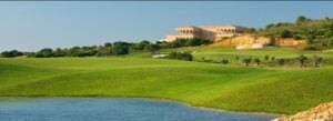 Amendoeira Faldo Golf Course clubhouse and lake