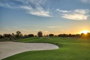 Dom Pedro Laguna Golf Course bunker sunset